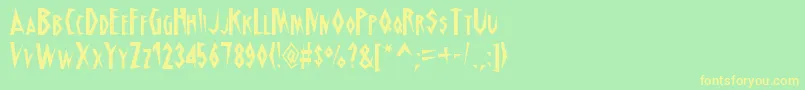 フォントSchrillAoe – 黄色の文字が緑の背景にあります