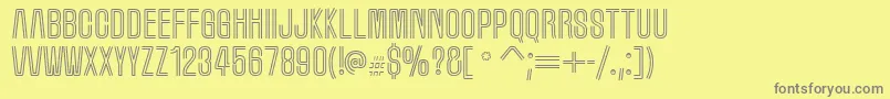 Marqueem-fontti – harmaat kirjasimet keltaisella taustalla