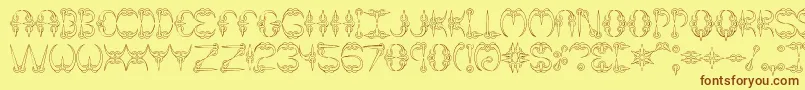 フォントClaw1Brk – 茶色の文字が黄色の背景にあります。