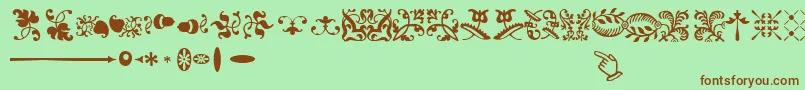 SabonnextLtOrnaments Font – Brown Fonts on Green Background