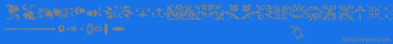 En savoir plus sur la police SabonnextLtOrnaments Police SabonnextLtOrnaments – polices grises sur fond bleu