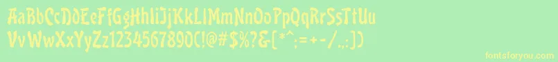 フォントLavaMf – 黄色の文字が緑の背景にあります