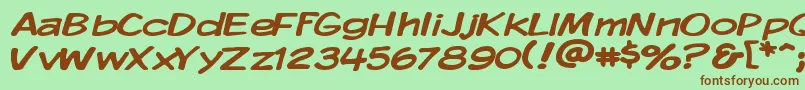 KomikaDisplayWide-fontti – ruskeat fontit vihreällä taustalla