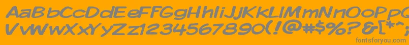 KomikaDisplayWide-Schriftart – Graue Schriften auf orangefarbenem Hintergrund