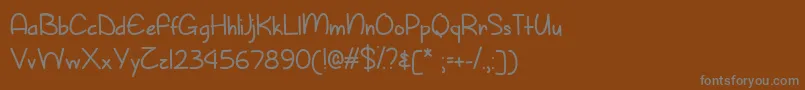 Więcej informacji o czcionce SunnySpringDayTtf Czcionka SunnySpringDayTtf – szare czcionki na brązowym tle
