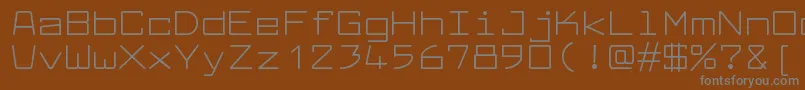 フォントLarabiefontexRegular – 茶色の背景に灰色の文字