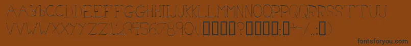 Czcionka Doctoraz – czarne czcionki na brązowym tle