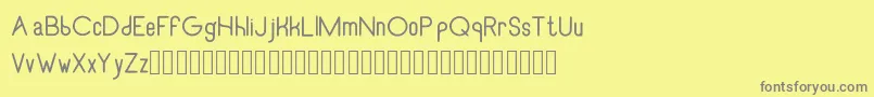 RecinosscriptRegular Font – Gray Fonts on Yellow Background