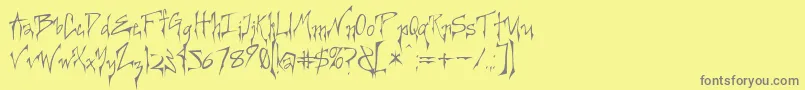 Creepygirl-Schriftart – Graue Schriften auf gelbem Hintergrund