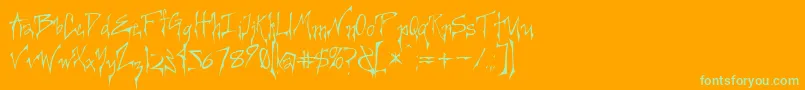 Czcionka Creepygirl – zielone czcionki na pomarańczowym tle