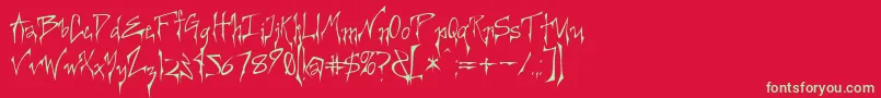 フォントCreepygirl – 赤い背景に緑の文字