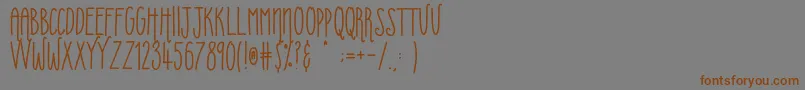Uberfriends-fontti – ruskeat fontit harmaalla taustalla