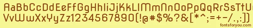 フォントNovaflat – 茶色の文字が黄色の背景にあります。