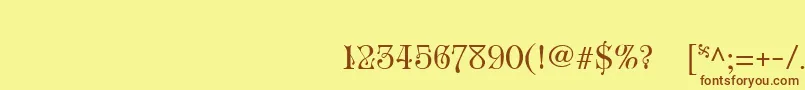 フォントRoseVersailles1 – 茶色の文字が黄色の背景にあります。