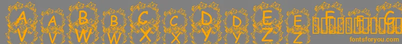 JennaSKitties-fontti – oranssit fontit harmaalla taustalla