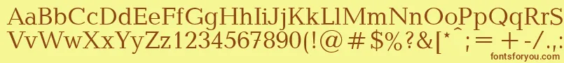 フォントBaltipla – 茶色の文字が黄色の背景にあります。
