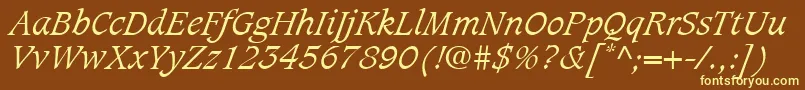 CaxtonLtLightItalic-fontti – keltaiset fontit ruskealla taustalla