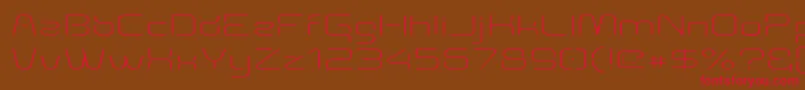 Aunchantedthinexpanded-fontti – punaiset fontit ruskealla taustalla