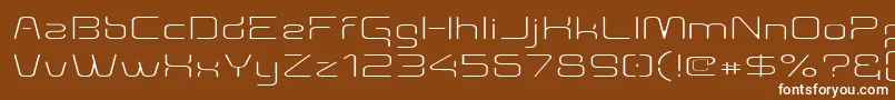 Aunchantedthinexpanded Font – White Fonts on Brown Background