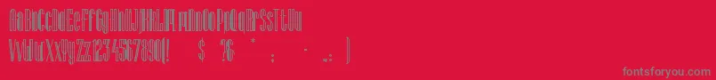 フォントLagniappeInline – 赤い背景に灰色の文字