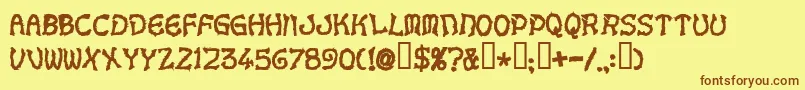 Шрифт Voodoodollletters – коричневые шрифты на жёлтом фоне