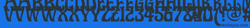 Doctorfibesdel-Schriftart – Schwarze Schriften auf blauem Hintergrund
