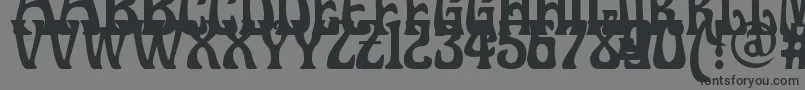 Doctorfibesdel-fontti – mustat fontit harmaalla taustalla