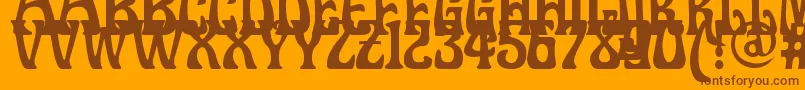 フォントDoctorfibesdel – オレンジの背景に茶色のフォント