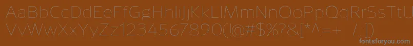 フォントSavileThin – 茶色の背景に灰色の文字