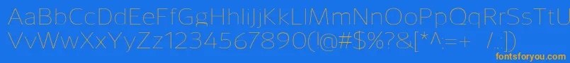 フォントSavileThin – オレンジ色の文字が青い背景にあります。