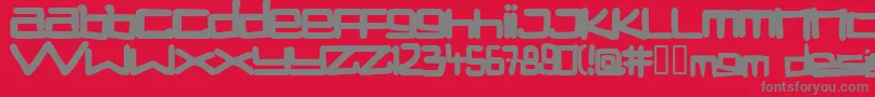 Weitere Informationen zur Stuck-Schriftart Stuck-Schriftart – Graue Schriften auf rotem Hintergrund