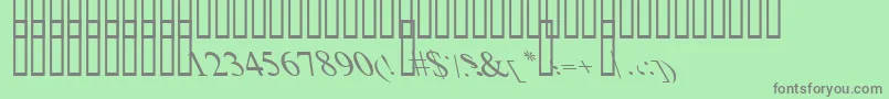 BoldItalicArt-fontti – harmaat kirjasimet vihreällä taustalla