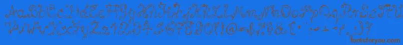 SpBlumeDb Font – Brown Fonts on Blue Background