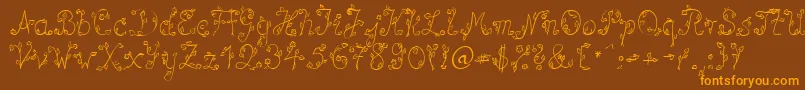 SpBlumeDb Font – Orange Fonts on Brown Background