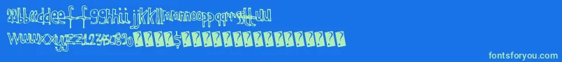Czcionka Kidsoutline – zielone czcionki na niebieskim tle