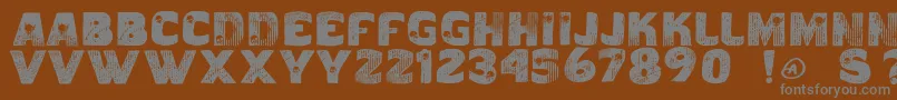 Vtkscaveirada Font – Gray Fonts on Brown Background