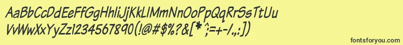 Komtxtti Font – Black Fonts on Yellow Background