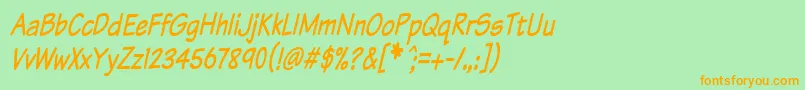 フォントKomtxtti – オレンジの文字が緑の背景にあります。