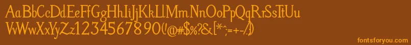 フォントLitosScriptBold – オレンジ色の文字が茶色の背景にあります。