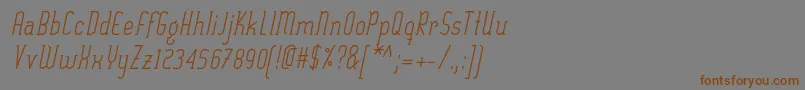 フォントSexythingRegularItalic – 茶色の文字が灰色の背景にあります。