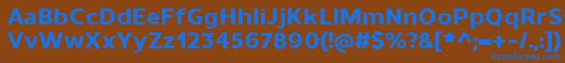 UnimanExtrabold Font – Blue Fonts on Brown Background