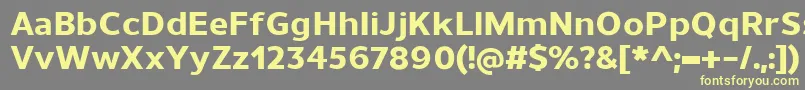 UnimanExtrabold Font – Yellow Fonts on Gray Background