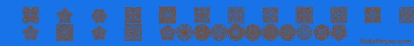Prtornament5-Schriftart – Braune Schriften auf blauem Hintergrund