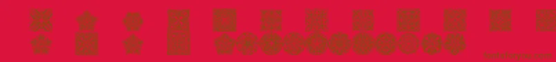 Prtornament5 Font – Brown Fonts on Red Background