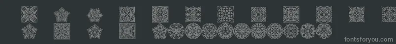Шрифт Prtornament5 – серые шрифты на чёрном фоне
