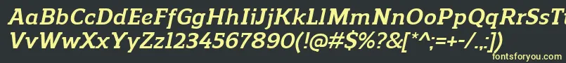 ReganslabBolditalic Font – Yellow Fonts on Black Background