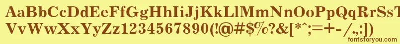 フォントJournalb – 茶色の文字が黄色の背景にあります。