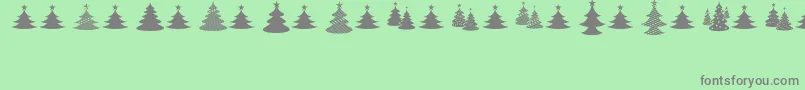 ChristmasI Font – Gray Fonts on Green Background