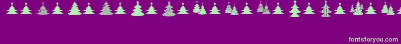 ChristmasI-Schriftart – Grüne Schriften auf violettem Hintergrund