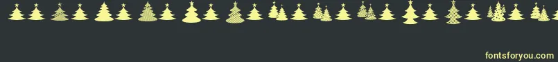 ChristmasI Font – Yellow Fonts on Black Background